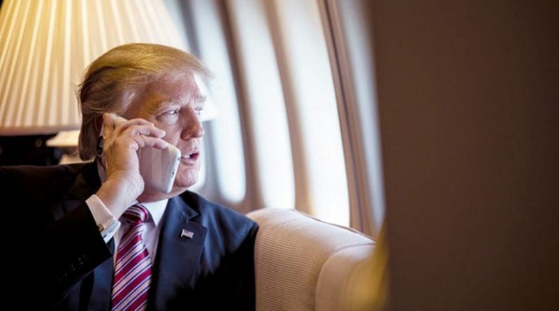 US President Donald Trump on board Air Force One. (Photo by Shealah Craighead, White House).