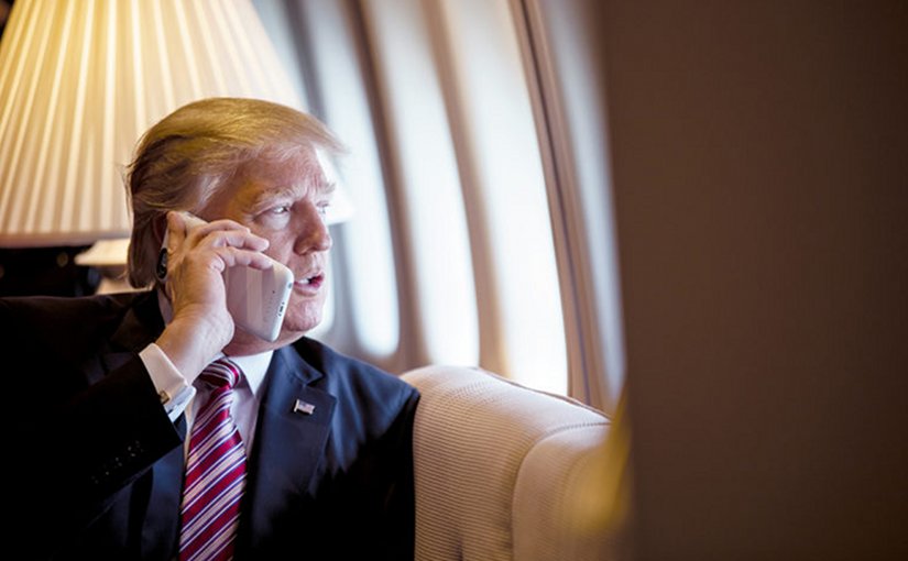 US President Donald Trump on board Air Force One. (Photo by Shealah Craighead, White House).