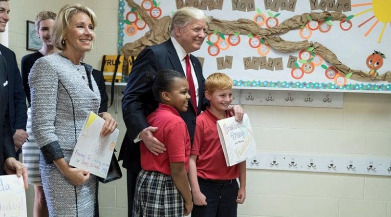 US President Donald Trump with schoolchildren. Photo Credit: White House