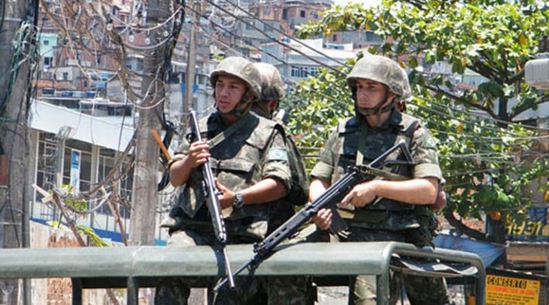 Members of Brazil's Army on security detail in poor neighborhood of Rio de Janeiro. Photo Credit: Agência Brasil -ABr, Wikimedia Commons.