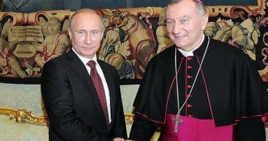 Russia's President Vladimir Putin with the Vatican's Cardinal Parolin. Photo Credit: Kremlin.ru
