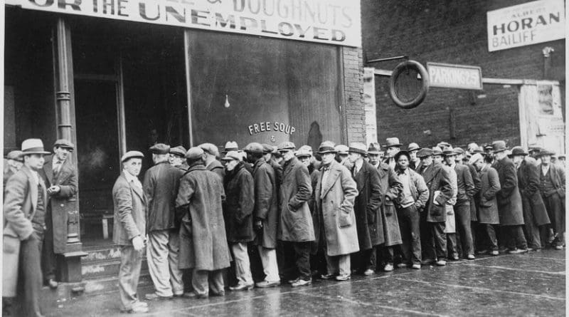Unemployed men outside a soup kitchen opened by Al Capone in Depression-era Chicago, Illinois, the US, 1931. Photo U.S. National Archives and Records Administration, Wikipedia Commons.