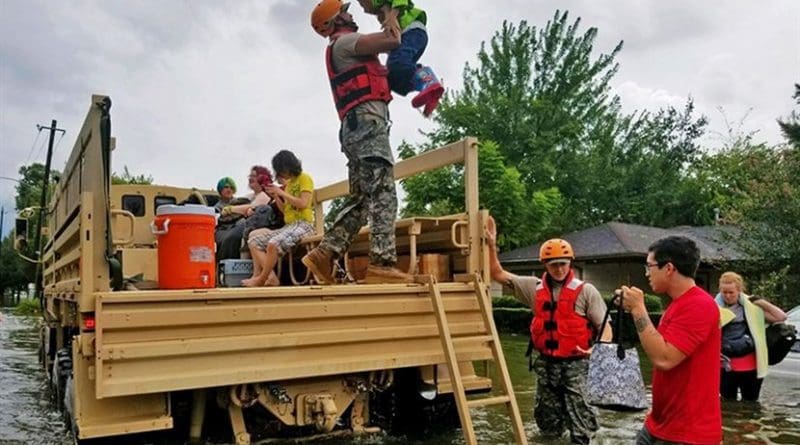 Texas National Guard soldiers assist residents affected by flooding caused by Hurricane Harvey in Houston, Aug. 27, 2017. National Guard photo by Lt. Zachary West