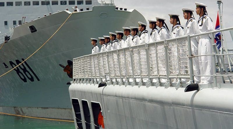 Sailors from China's Navy man the rails aboard the destroyer Qingdao (DDG 113). U.S. Navy photo by Mass Communication Specialist Joe Kane