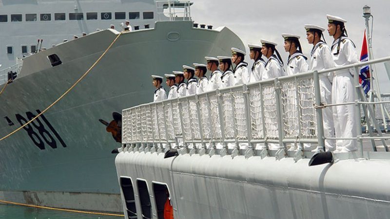 Sailors from China's Navy man the rails aboard the destroyer Qingdao (DDG 113). U.S. Navy photo by Mass Communication Specialist Joe Kane