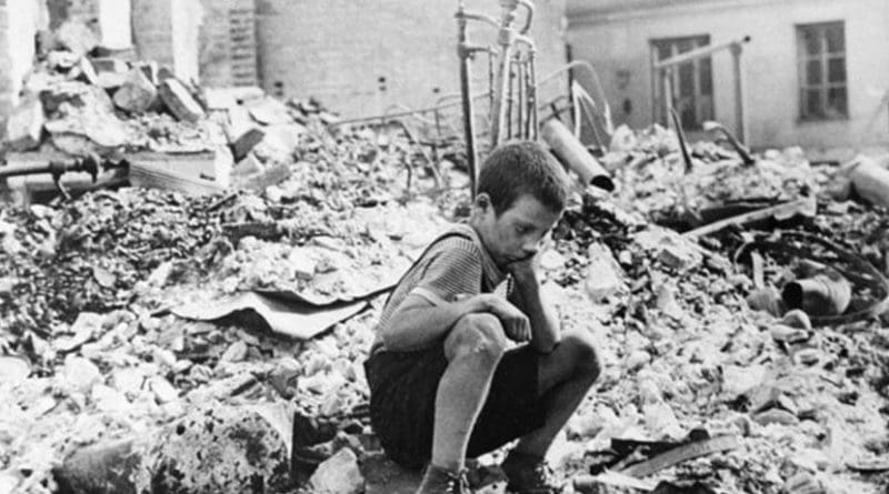 A young survivor of Nazi Germany's 1939 bombing of Warsaw. Poland has estimated that over $40bn of damage was done. [Julien Byrne/ Wikimedia]