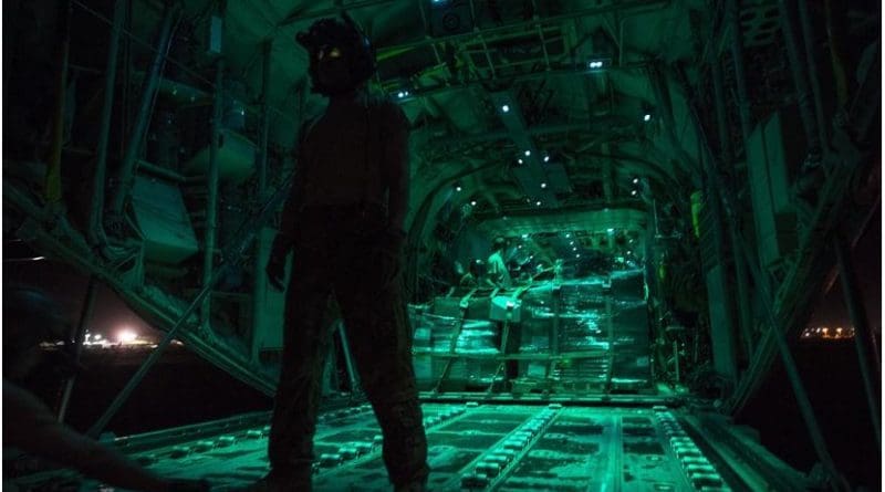 Air Force Senior Airman Garrett Cornett, a loadmaster from the 75th Expeditionary Airlift Squadron, waits for a cargo load during a mission in Somalia in support of the Combined Joint Task Force-Horn of Africa, May 26, 2017. Air Force photo by Master Sgt. Russ Scalf