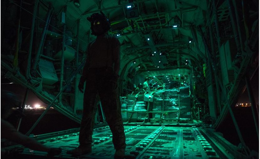 Air Force Senior Airman Garrett Cornett, a loadmaster from the 75th Expeditionary Airlift Squadron, waits for a cargo load during a mission in Somalia in support of the Combined Joint Task Force-Horn of Africa, May 26, 2017. Air Force photo by Master Sgt. Russ Scalf