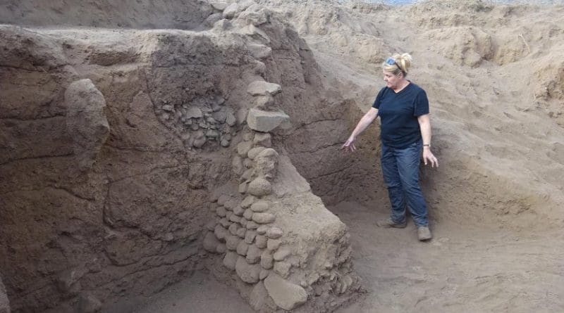 Carol Lang, University of York, examines the terrace systems of Engaruka. Credit University of York