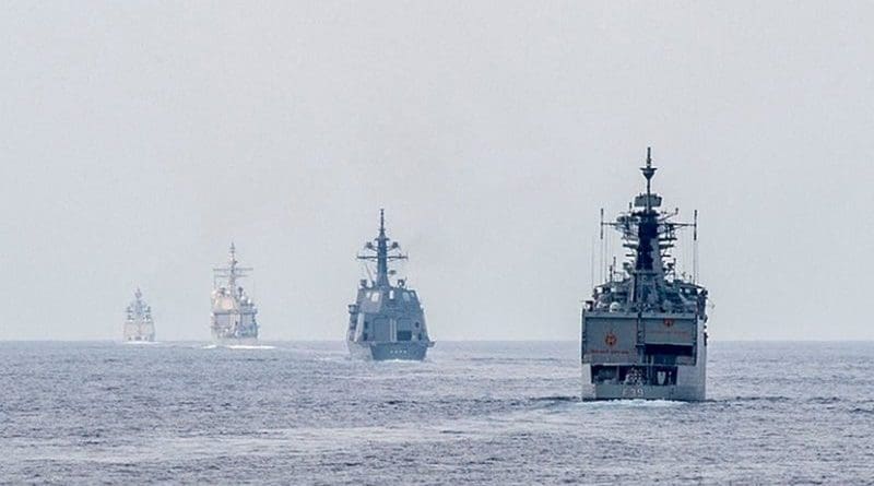 Ships from the Indian navy, Japan Maritime Self Defense Force and U.S. Navy get into formation for a gunnery live-fire exercise as part of Exercise Malabar. U.S. Navy photo by Mass Communication Specialist 2nd Class Joe Bishop.