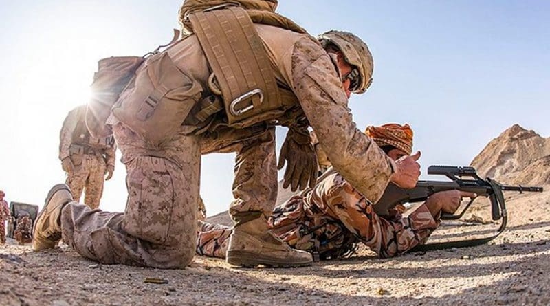 Omani soldiers and US Marines exercising. Photo Credit: U.S. Marine Corps photo by Gunnery Sgt. Robert B. Brown Jr., Wikipedia Commons.