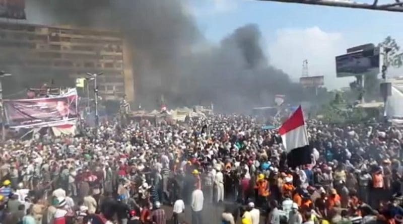 Rabaa al-Adawiya, Egypt, during the dispersal of Morsi supporter sit-ins on August 14. Photo by Amsg07, Wikipedia Commons.