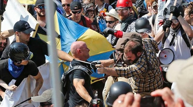 Demonstrators and counterdemonstrators clash at Emancipation Park in Charlottesville, Viriginia, on August 12, 2017. Photo Credit: VOA, Wikipedia Commons.