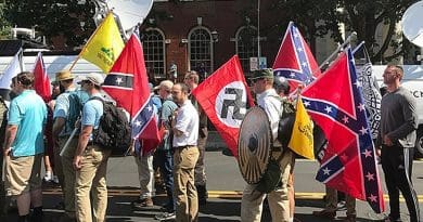 Protesters at Charlottesville, Virginia rally carrying Confederate flags, Gadsden flags and a Nazi Flag. Photo byAnthony Crider, Wikipedia Commons.