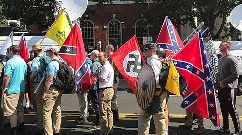 Protesters at Charlottesville, Virginia rally carrying Confederate flags, Gadsden flags and a Nazi Flag. Photo byAnthony Crider, Wikipedia Commons.