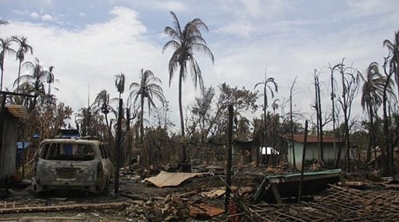 A burnt down house in a Rohingya village in northern Rakhine State. Photo by Moe Zaw (VOA), Wikipedia Commons.