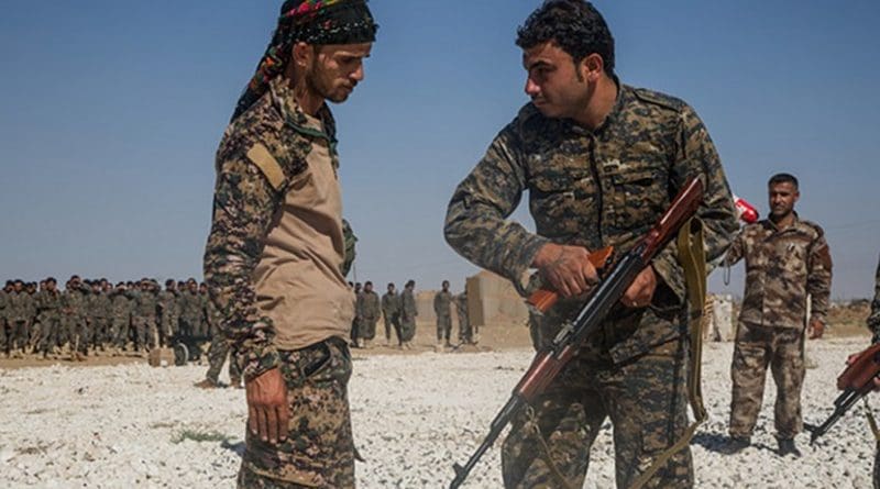 A trainee with the Pentagon-backed Syrian Democratic Forces learns how to use his AK-47-style rifle at a secret training camp. Photo: U.S. Army Sgt. Mitchell Ryan