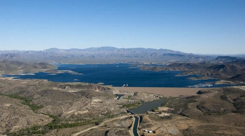 Evaporation-harvested energy can cut by half the water lost to natural evaporation, researchers say. Water-strapped cities with growing populations and energy needs could benefit most, including greater Phoenix, served by the above reservoir and irrigation system fed by the Colorado River. Credit Central Arizona Project