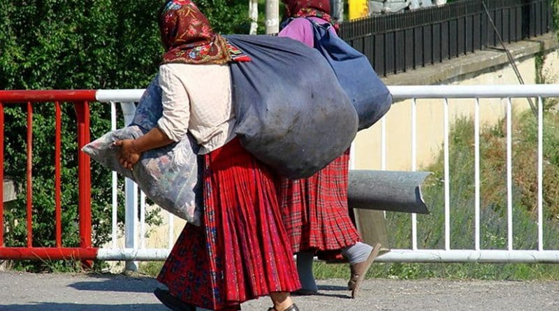 Roma (Gypsy) women returning from market in Sighisoara, Romania. Photo by Adam Jones adamjones.freeservers.com, Wikipedia Commons.
