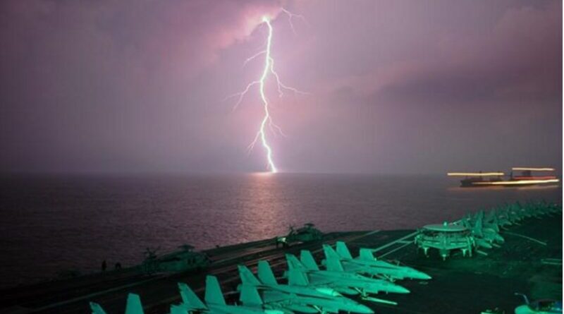 This is lightning behind an aircraft carrier in the Strait of Malacca. Credit: pxhere.com