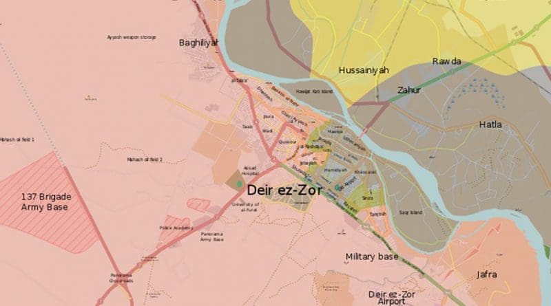 The situation in Deir ez-Zor on September 12, 2017. Pink area controlled by Syrian government forces; Yellow by Syrian Democratic Forces, and: Grey by Islamic State. Source: Wikipedia Commons.