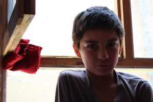 Inaam is a thoughtful, hardworking child. Photo Credit: Dr. Hakim Young.