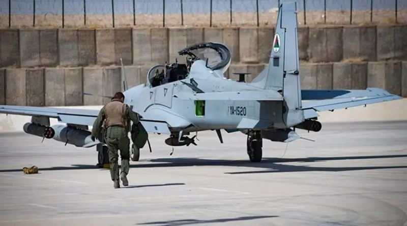 An Afghan A-29 pilot walks toward his aircraft at Kandahar Airfield, Afghanistan. The Afghan air force plans and conducts all A-29 combat missions throughout Afghanistan. Air Force photo by Staff Sgt. Alexander W. Riedel