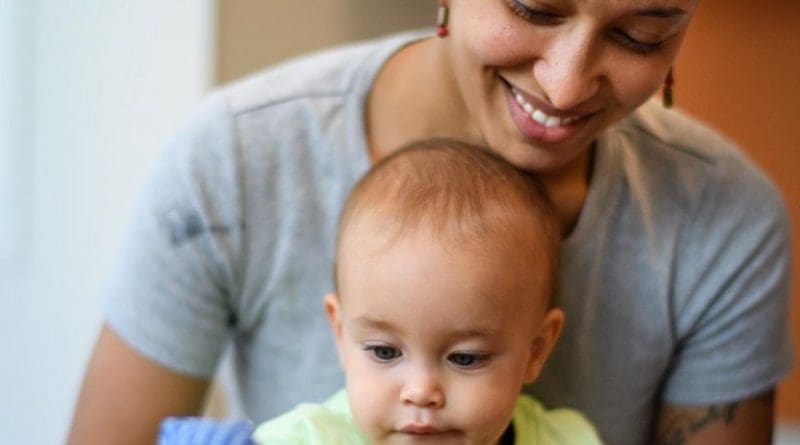 A mother plays with her baby in the Princeton Baby Lab, where researchers have identified consistent shifts in vocal timbre between mothers speaking or reading to their children and speaking to other adults. Credit Sameer A. Khan/Fotobuddy