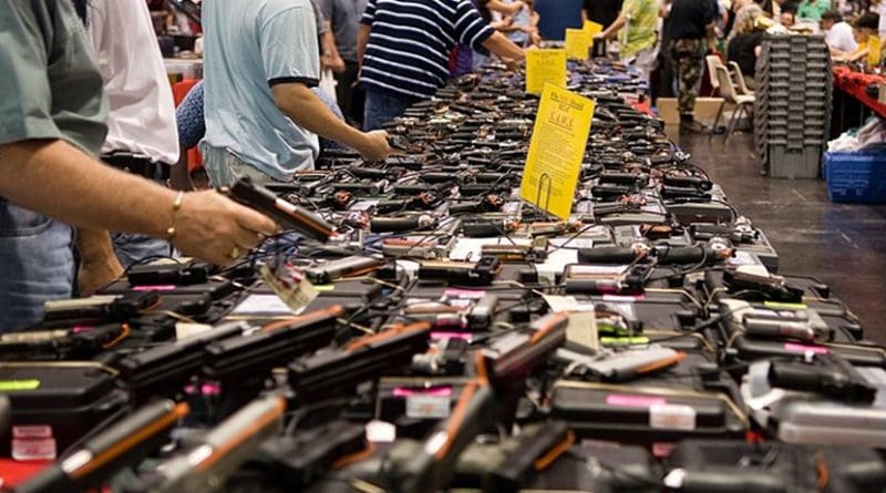 File photo of Houston gun show at the George R. Brown Convention Center. Photo by http://flickr.com/photos/glasgows/, Wikipedia Commons