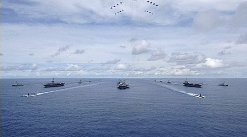 USS Nimitz (CVN 68), USS Kitty Hawk (CV 63) and USS John C. Stennis (CVN 74) Carrier Strike Groups transit in formation during a joint photo exercise. U.S. Navy photo by Mass Communication Specialist Seaman Stephen W. Rowe.
