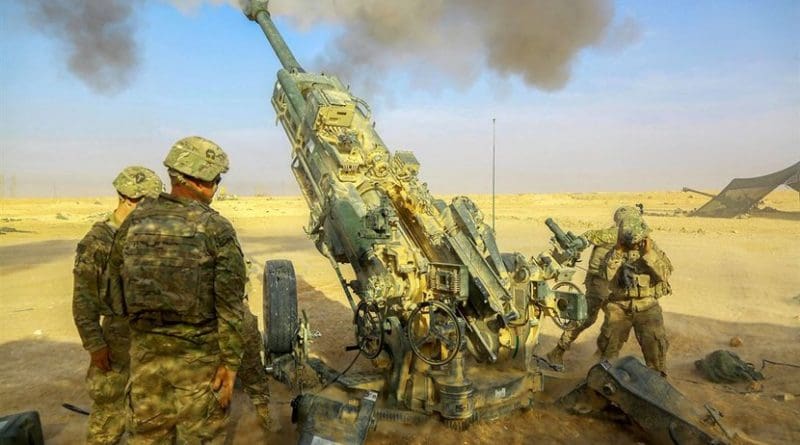 Soldiers fire an M777A2 howitzer while supporting Iraqi Security Forces near al-Qaim, Iraq, Nov. 7, 2017, as part of the effort to defeat the Islamic State of Iraq and Syria. Army photo by Spc. William Gibson