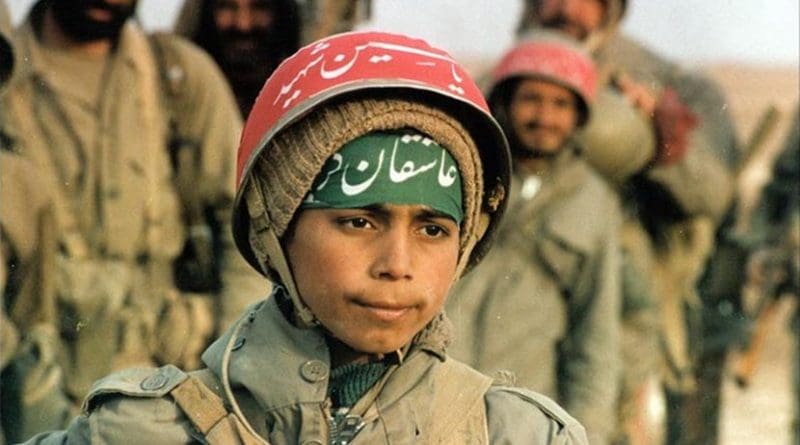Child soldier during the Iran–Iraq War. Source: Wikipedia Commons.