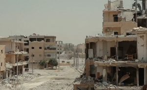 A destroyed part of Raqqa, Syria. Photo by Mahmoud Bali (VOA), Wikimedia Commons.