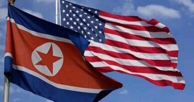 Flags of North Korea and the United States.