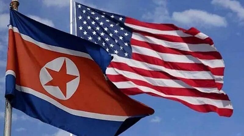 Flags of North Korea and the United States.