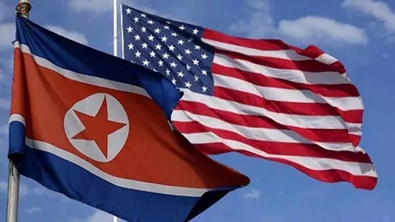 Flags of North Korea and the United States.