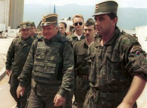 General Ratko Mladic (centre) arrives for UN-mediated talks at Sarajevo airport, June 1993. (Source: Mikhail Evstafiev)