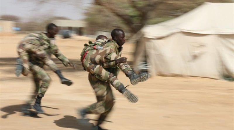 Nigerien soldiers practice buddy-carry techniques in a first aid class during Flintlock 2017 in Diffa, Niger, March 4, 2017. Flintlock is a special operations forces exercise designed to hone the capabilities of U.S. and partner-nation military units in Trans-Saharan Africa. Army photo by Staff Sgt. Kulani Lakanaria