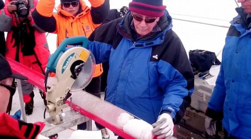 Lonnie Thompson, Distinguished University Professor in the School of Earth Sciences at The Ohio State University, cuts an ice core retrieved from the Guliya Ice Cap in the Kunlun Mountains in Tibet in 2015. Credit Photo by Giuliano Bertagna, courtesy of the Byrd Polar and Climate Research Center.