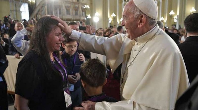 Pope Francis blesses a woman after venerating the relics of Peruvian saints in the Cathedral of Lima, Jan. 21. Credit: Vatican Media/CNA