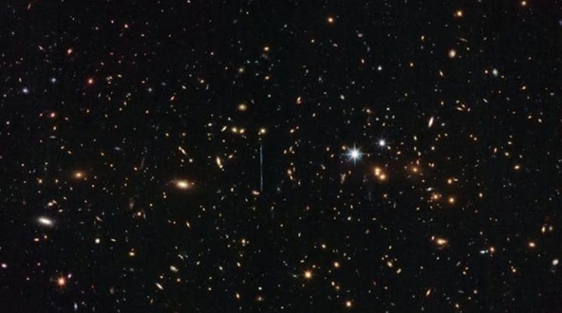 This image was taken by Hubble's Advanced Camera for Surveys and Wide-Field Camera 3 as part of an observing program called RELICS (Reionization Lensing Cluster Survey). RELICS imaged 41 massive galaxy clusters with the aim of finding the brightest distant galaxies for the forthcoming James Webb Space Telescope to study. Credit ESA/Hubble & NASA, RELICS