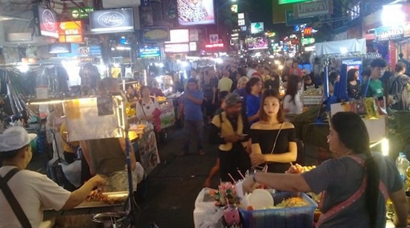 Photo: Bangkok's Khaosan area at night, with street vendors. Credit: Kalinga Seneviratne | IDN-INPS