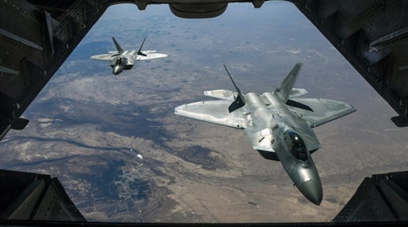 File photo of two Air Force F-22 Raptors fly over Syria, while supporting Operation Inherent Resolve. Air National Guard photo by Staff Sgt. Colton Elliott