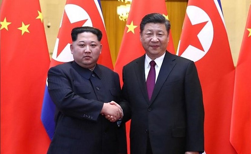 North Korean leader Kim Jong Un with China's President Xi Jinping. Photo Credit: Tasnim News Agency.