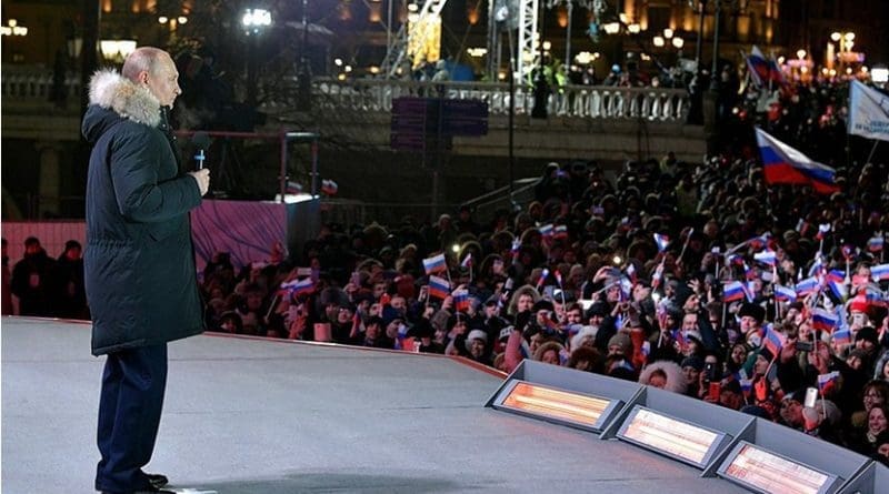 Russia's Vladimir Putin addresses rally on Manezhnaya Square in Moscow. Photo Credit: Kremlin.ru