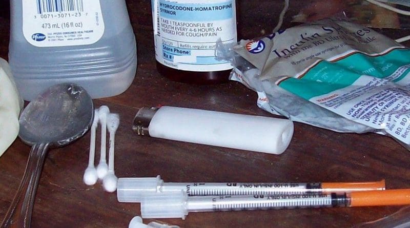 A clandestine kit containing materials to inject drugs. Source: Wikipedia Commons.