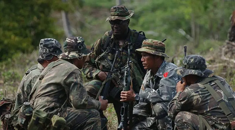 A Special Forces Soldier conducts Security Assistance Training for members of the Philippine Army's 1st Infantry (TABAK) Division. Photo by Edward G. Martens, Wikipedia Commons.