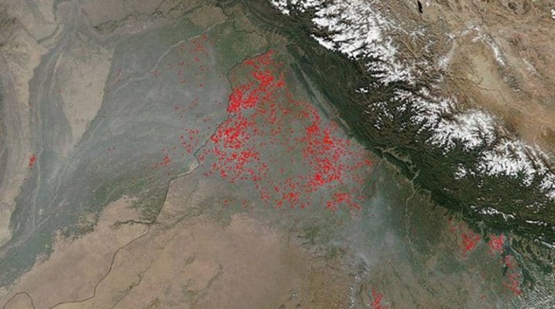 This image, captured by NOAA/NASA's Suomi NPP's Visible Infrared Imaging Radiometer Suite (VIIRS), shows agricultural fires in the northernmost section of the Punjab state of India in October 2017. Actively burning areas, detected by VIIRS are outlined in red. Credit NASA/ Jeff Schmaltz, MODIS Rapid Response Team