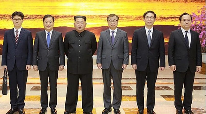 North Korea's Kim Jong-un meeting with South Korean envoys at the Workers' Party of Korea