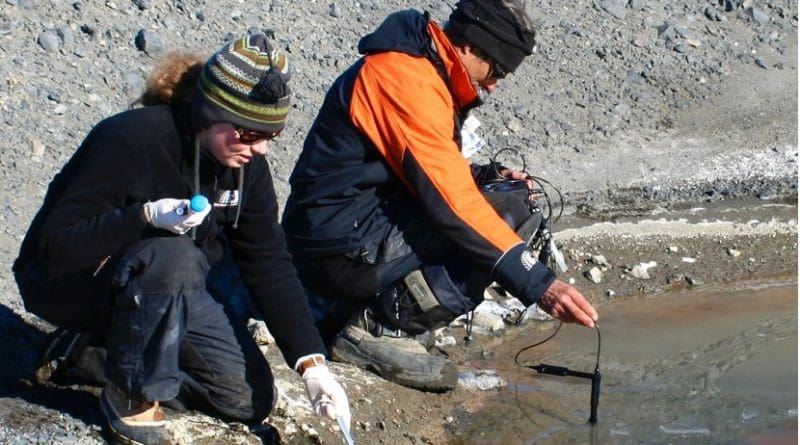 Dr. Anne D. Jungblut is collecting cyanobacteria samples on the McMurdo Ice Shelf, Antarctica. Credit Taylor & Francis